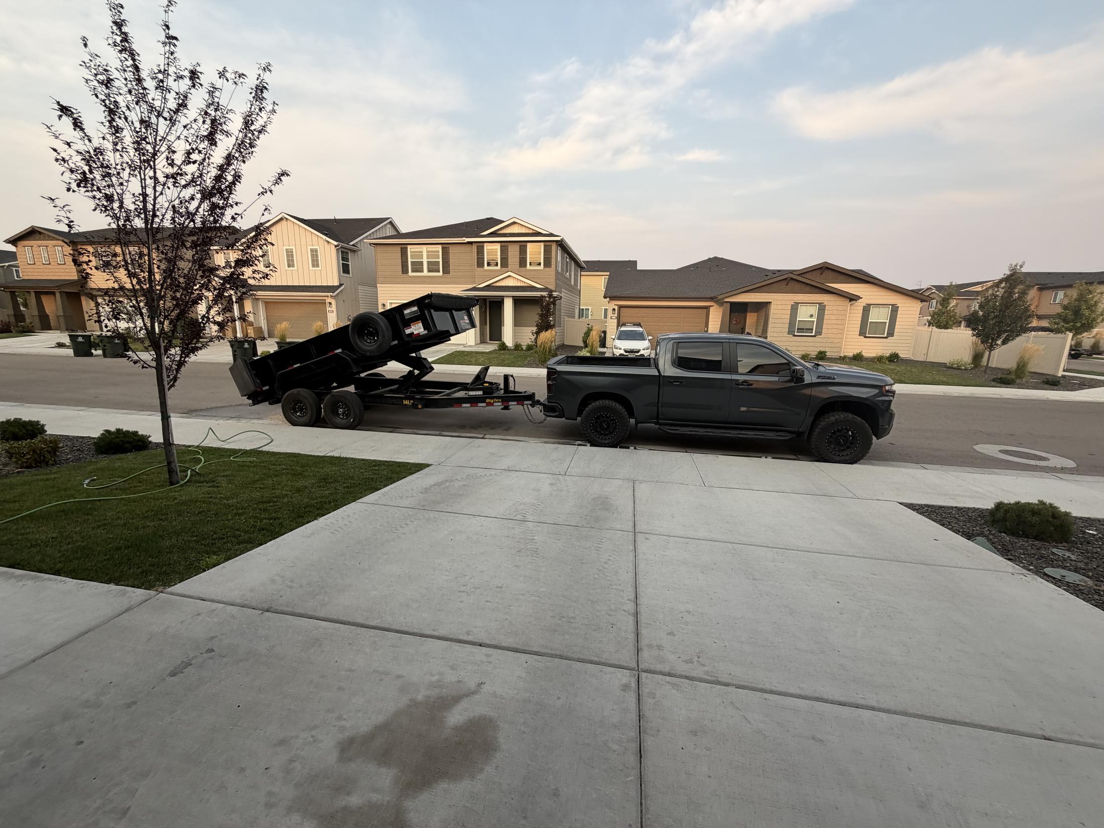 The HaulWorks truck and trailer, the same rig Jeff drives on every junk removal job in Meridian and the Treasure Valley